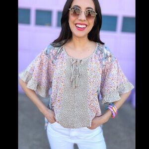 Multi print floral blouse. EUC in size small. Could fit medium